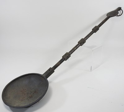 Lot 119 - A large African tribal bronze ladle or scoop,...
