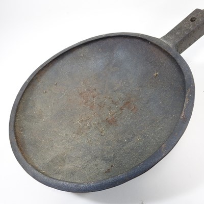 Lot 119 - A large African tribal bronze ladle or scoop,...
