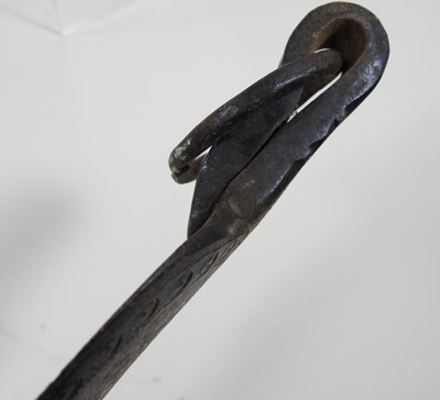 Lot 119 - A large African tribal bronze ladle or scoop,...