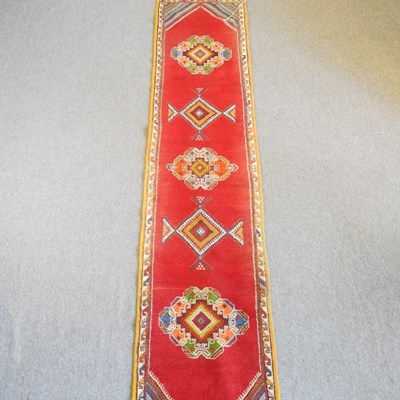 Lot 331 - A Moroccan runner, with coloured diamond...
