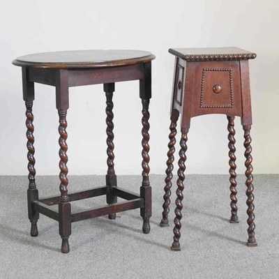 Lot 317 - A 1920's oak occasional table, together with a...