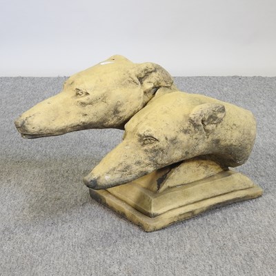 Lot 469 - A cast stone sculpture of a pair of greyhound heads