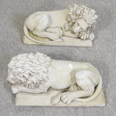 Lot 472 - A pair of reconstituted stone models of recumbent lions