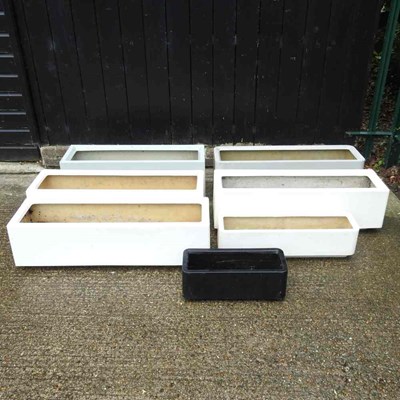 Lot 387 - A collection of fibreglass garden planters (7)
