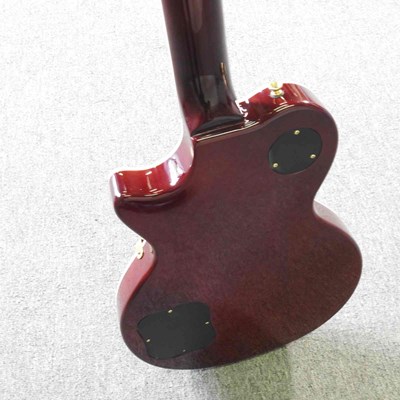 Lot 318 - A red Johnson Les Paul electric guitar