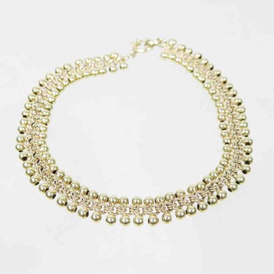 Lot 1 - A 9 carat gold flexible link bracelet, 8.8g,...