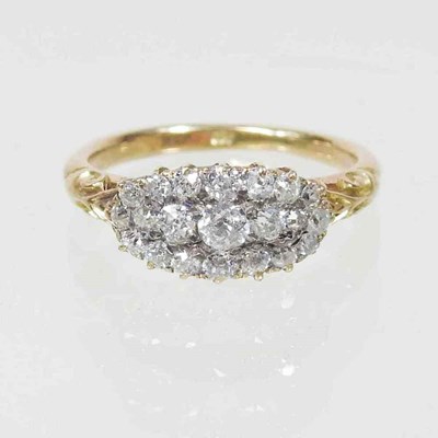 Lot 303 - A diamond cluster ring, of elliptical shape,...