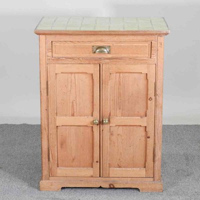 Lot 384 - An early 20th century pine cabinet, with a...
