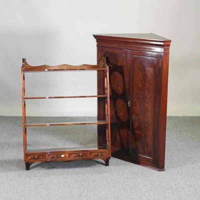 Lot 451 - An early 20th century mahogany hanging corner...