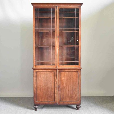 Lot 8 - A 19th century mahogany cabinet bookcase, on...