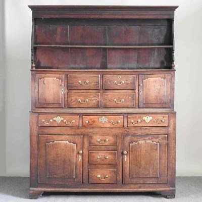 Lot 173 - An 18th century and later Welsh oak dresser,...