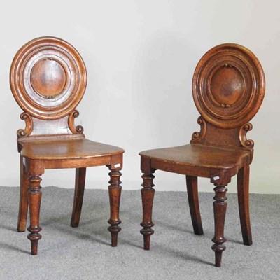 Lot 191 - A pair of Victorian oak shield back hall...