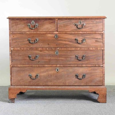 Lot 175 - A George III mahogany chest, on bracket feet