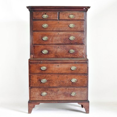 Lot 29 - A George III plum pudding mahogany chest on...