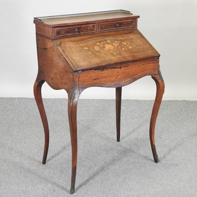 Lot 555 - A late 19th century French style marquetry bureau de dame
