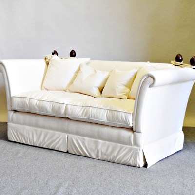 Lot 224 - A Laura Ashley cream upholstered knole drop...