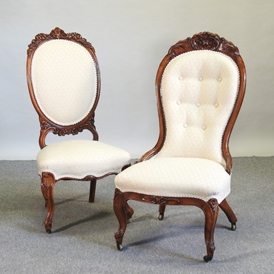 Lot 559 - A near pair of Victorian cream upholstered nursing chairs