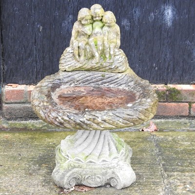 Lot 11 - A reconstituted stone bird bath