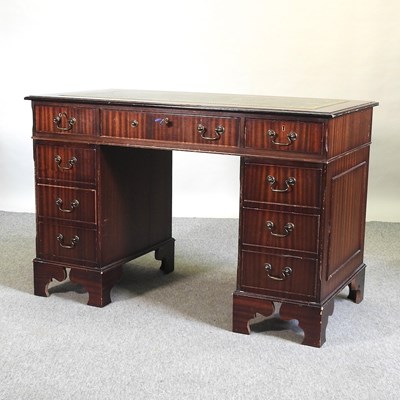 Lot 560 - A reproduction pedestal desk