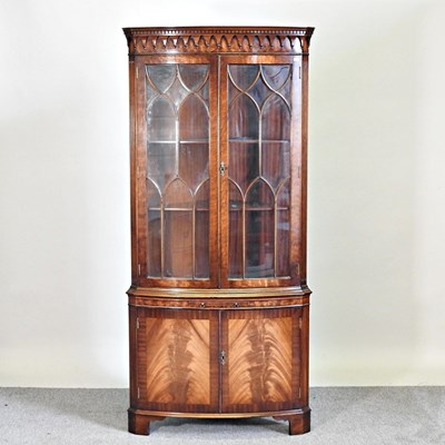 Lot 536 - A good quality reproduction bow front standing...