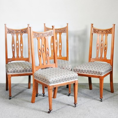Lot 570 - A set of four Arts and Crafts light oak high...