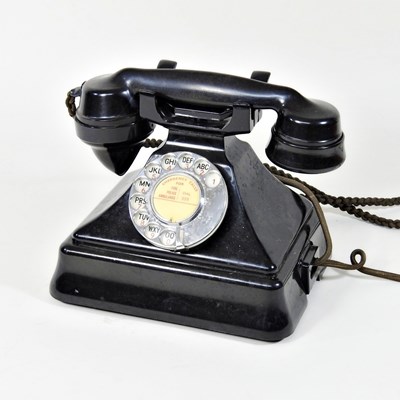 Lot 343 - A black bakelite rotary dial telephone