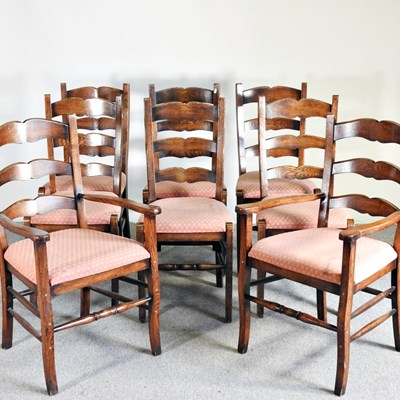 Lot 530 - A large handmade circular oak dining table, on...