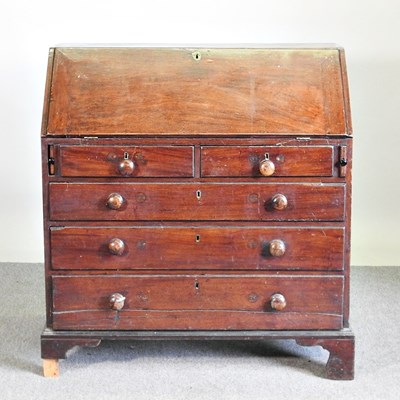 Lot 622 - An 18th century mahogany bureau, on bracket feet