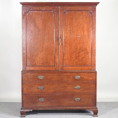 Lot 341 - A George III mahogany dwarf linen press, on...