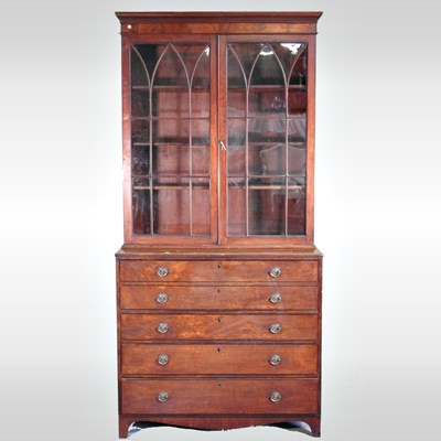 Lot 551 - A Regency mahogany and ebony strung secretaire...
