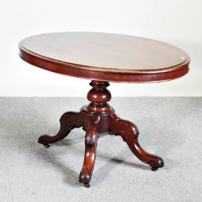 Lot 540 - A Victorian oval dining table, with a hinged...