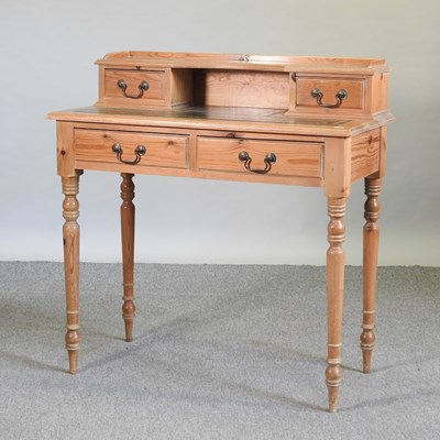 Lot 486 - A pine writing desk