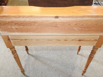 Lot 486 - A pine writing desk