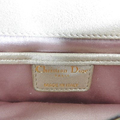 Lot 108 - A Dior pale gold coloured clutch bag