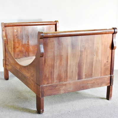 Lot 405 - An early 20th century French fruitwood sleigh...