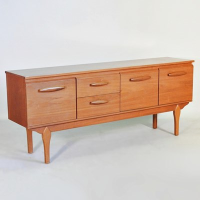 Lot 488 - A 1960's G Plan style teak sideboard, on...