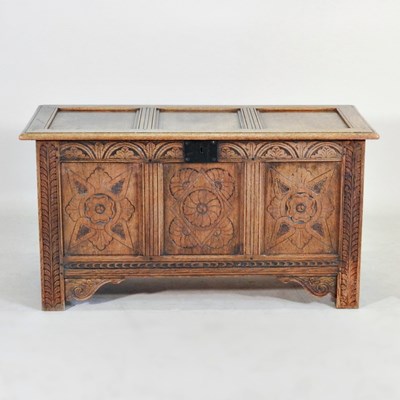 Lot 601 - An 18th century style carved oak coffer, 20th...
