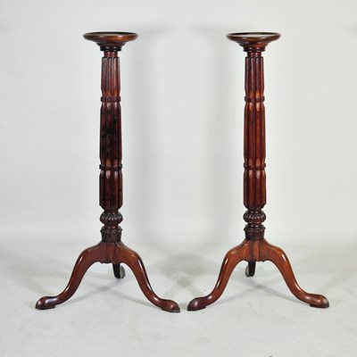 Lot 496 - A pair of Victorian style carved torcheres,...