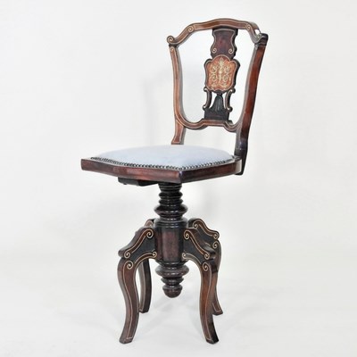 Lot 17 - An Edwardian inlaid music chair, with a...