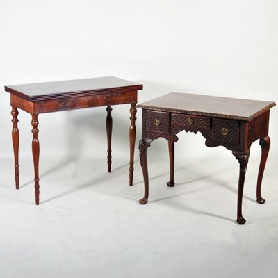 Lot 522 - An 18th century style carved oak lowboy,...