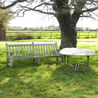 Lot 306 - A hardwood extending garden table