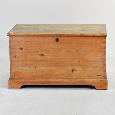 Lot 353 - An antique pine blanket box, with a hinged lid