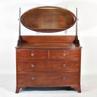 Lot 191 - An Edwardian mahogany bow front dressing chest,...