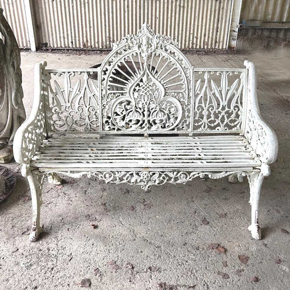 Lot 275 - A cast iron Coalbrookdale style white