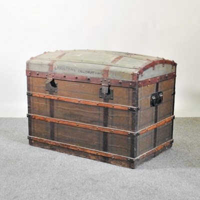 Lot 54 - A 19th century dome top wooden bound trunk