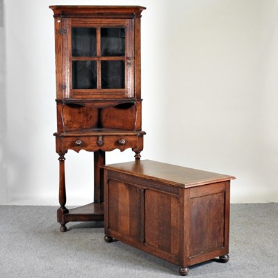 Lot 482 - An oak standing corner cabinet, 75cm wide,...