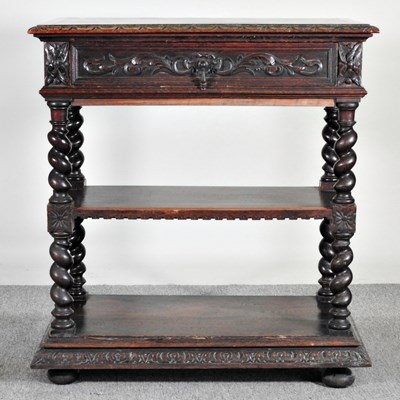 Lot 85 - A 19th century carved oak buffet, united by...