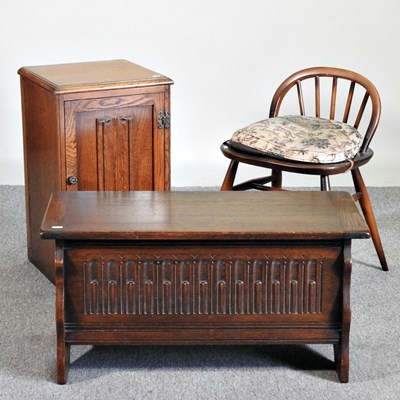 Lot 329 - A 1970's Ercol dark elm dressing table stool,...