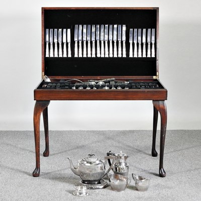 Lot 57 - A table canteen of silver plated cutlery, with...