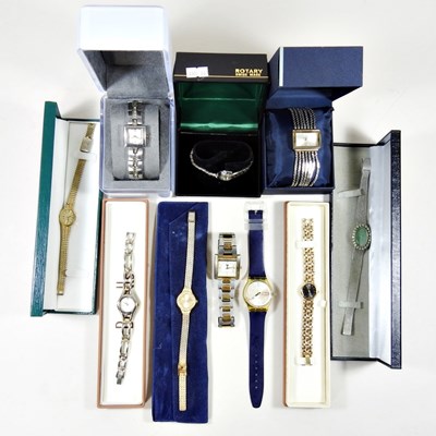 Lot 492 - A DKNY ladies dress watch, boxed, together...